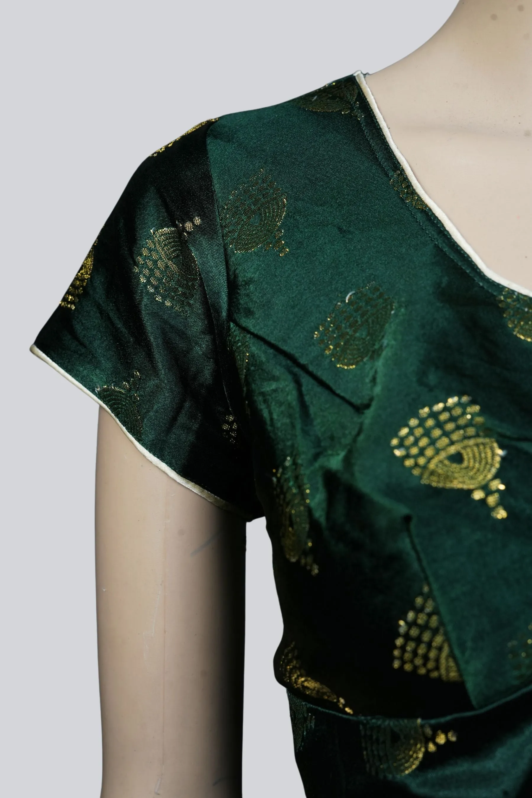 Green Brocade Blouse: Elegance Adorned with Jhumka Motifs at JCSFashions